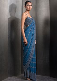 Draped pre-stitched tulle sari embellished with tonal embroidery with matching embroidered blouse. Tonal Embroidery, Embroidered Blouse, Embroidery, Blue