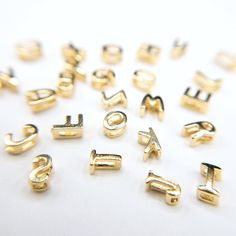 ♥ For 925 Silver Alphabet charms please check here: https://www.etsy.com/listing/1162011283 5mm to 6mm dainty alphabet slide charms for personalized jewelry and minimalist jewelry. Top-quality long lasting 22K gold plated over Sterling Silver charms. Short Details: · Size is around 5mm to 6mm (3/16") in length depending on the letter. · Hole is around 1mm to 1.5mm in the middle of the charm for chain and beading cord to string through. · 22K gold plated over 925 sterling silver. · Letter M and W Alphabet Charms, Silver Initial Charms, Small Letter, Unique Fashion Jewelry, Customizable Jewelry, Beading Cord, Alphabet Beads, Sterling Silver Initial, Letter M