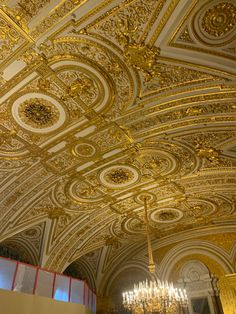 an ornate ceiling with chandeliers and lights