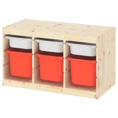 three red and white buckets are in a wooden storage unit with dividers on the sides