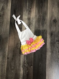 "This adorable romper is perfect for your princess' first birthday outfit. It makes a great photo prop for birthday invitations or to pictures just to remember this special day!! The romper has straps that untie so you can lower or raise the outfit for a better fit. The back of the romper has layers of ruffle and the top of the ruffles is embellished with a gold bow. If you would like a different color bow, please message me with the color that you would like. The headband is made to fit the siz Summer First Birthday Bubble Romper With Ruffles, Ruffled Bubble Romper For First Birthday In Summer, Summer Bubble Romper With Ruffles For First Birthday, Summer Ruffled Bubble Romper For First Birthday, Sleeveless Bubble Romper For Spring Birthday, Summer Birthday Bubble Romper With Ruffles, Summer Birthday Ruffle Bubble Romper, Sweet Bubble Romper For Spring Birthday, White Bubble Romper For Cake Smash In Spring