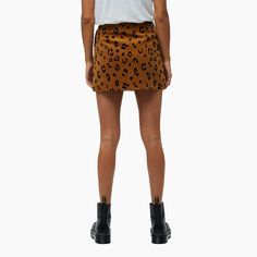 Women's mini skirt made of 'Corduroy', a thick, soft-touch fabric composed of crisscrossed fibers. Features a front zipper closure. Leopard print around the garment. Embroidered Obey label. Leopard Corduroy Skirt, Corduroy Mini Skirt Brown, Obey Clothing, Front Zipper, Leopard Print, Womens Skirt, Mini Skirts, Zipper, Black