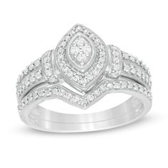 a white gold ring with diamonds on it