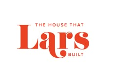 the house that laps built logo on a white background with red lettering and an orange font