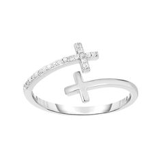 Decorated with sparkling round-cut diamonds, this sterling silver cross bypass ring is a stunning testament to your faith.RING DETAILS     Width: 0.45 in.     Metal: sterling silver     Plating: rhodium     Packaging: boxed                      DIAMOND DETAILS     Total weight: 1/10 ct.     Shape: round     Color grade: I-J     Clarity: I2-I3     Setting: prong            Gemstones may have been treated to enhance their appearance. Special care may be required. Please visit our Gemstone Treatmen Bypass Ring, Right Hand Rings, Diamond Cross, Cross Ring, Sterling Silver Cross, Silver Cross, Round Cut Diamond, Womens Jewelry Rings, Rings Statement