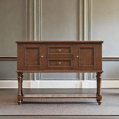 a wooden table with two drawers on it