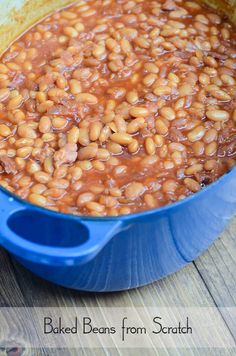 baked beans from scratch in a blue pot on a wooden table with text overlay