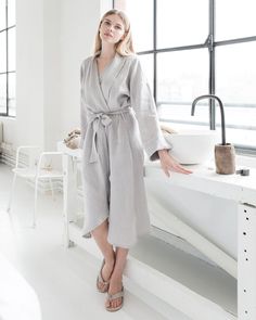 Relax and unwind in a comfortable, soft linen robe. Designed to have a loose fit, it can be cinched at the waist with a tie. Long sleeves can be rolled up to form ¾ sleeves. Highly breathable and absorbent, it’s an irreplaceable bath accessory. • Medium weight linen (approx. 200 gsm) Please note that due to the many variations in monitors and browsers, actual colors may vary. • Features two side pockets and a waist tie• Made from 100% European flax• Stone washed for maximum softness Womens Robe, Linen Bathrobe, Review Clothing, Linen Robe, Wrinkled Clothes, Linen Pajamas, Linen Loungewear, Fresh Linen, Lazy Sunday