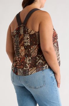 This sleeveless top in an easy, relaxed fit is an excellent addition to your chill-time wardrobe. V-neck Sleeveless, with cutaway shoulders 100% silk Dry clean Imported Chic V-neck Rayon Tank Top, Chic Sleeveless Viscose Tank Top, Chic Viscose Sleeveless Tank Top, Casual Brown Halter Neck Tank Top, Chic Tank Strap Tops For Vacation, Chic Vacation Tops With Tank Straps, Summer Sleeveless Viscose Tank Top, Brown Sleeveless Halter Top For Spring, Casual Brown Sleeveless Halter Top