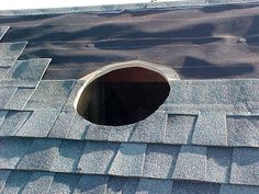 an open hole in the roof of a house