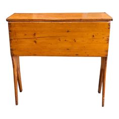 an old wooden table with two legs and a drawer on one side, against a white background