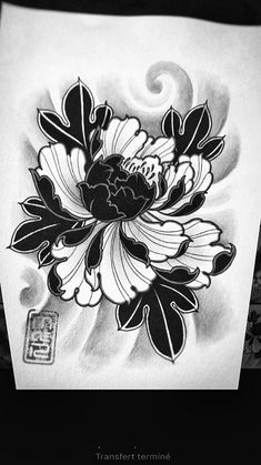 a black and white drawing of a flower