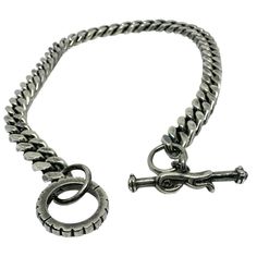 Expertly crafted for the modern man, our Celtic Bird Curb Chain is a striking addition to any outfit. Made from high-quality sterling silver 925, its unique design features a hand-carved t-bar and jump ring, adding a touch of sophistication. With a width of 9mm and a length of 39cm, it's the perfect accessory to elevate your style game. To maintain the beauty and longevity of your Sterling Silver Chain, follow these care tips:  Daily Care: Avoid exposing your necklace to harsh chemicals, such as perfumes, lotions, hairsprays, or cleaning agents, which may tarnish the silver. Remove the necklace before swimming, showering, or exercising to prevent contact with water, sweat, and chlorine. Cleaning: Gently clean your chain with a soft, lint-free cloth to remove dirt and oils. For deeper clean Celtic Bird, Italian Jewelry Designers, Italian Jewelry, Forever Jewelry, Mens Jewelry Necklace, Jewelry Ring Box, Men's Necklace, Fine Earrings, Watch Necklace