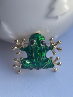 Enamel frog brooch with rhinestone eyes, arrives boxed. Can be used for DIY crafting and making brooch bouquets, decorating jewellery boxes, photo frames, hats or anything wedding related. Frog Rings Jewelry, Frog Hot Topic Jewelry, Golden Frog, Gold Frog Necklace, Frog Brooch, Frog Necklace, Frog Jewelry, Frog Gifts, Brooch Bouquets