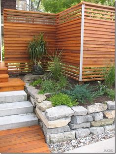 an image of a wooden privacy fence with steps and modern ideas on the bottom right hand side