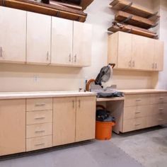 a kitchen with lots of cabinets in it