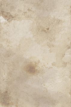 an old, dirty wall with some stains on it and one light brown spot in the middle