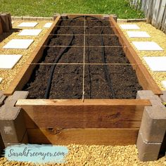 the garden is ready to be planted and put into the ground with concrete blocks around it