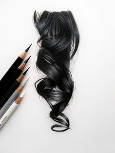 a drawing of a long black hair with pencils next to it on a white surface