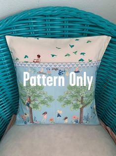 a blue wicker chair sitting next to a pillow with the words pattern only on it