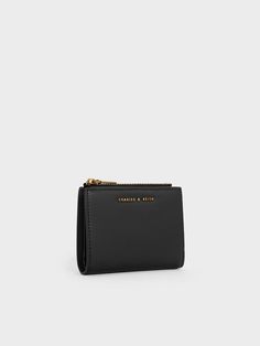 Chic Everyday Wallet With Zipper Closure, Chic Wallets With Zipper Closure For Everyday, Minimalist Black Travel Wallet, Minimalist Black Travel Wallets, Minimalist Black Wallet For Travel, Modern Bifold Card Holder For Evening, Minimalist Black Everyday Wallet, Trendy Everyday Bifold Clutch, Chic Black Coin Purse For Gift