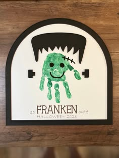 a sign with a handprinted image of a monster on it