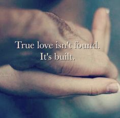 two hands holding each other with the words true love isn't found it's built