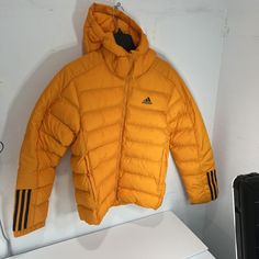 Adidas Itavic Puffer Jacket Mens Orange Size Small. Condition Is New With Tags. Shipped With Usps Ground Advantage. Winter Sports Long Sleeve Outerwear, Winter Sports Puffer Jacket With Long Sleeves, Hooded Sport Coat For Fall Winter Sports, Adidas Functional Hooded Outerwear, Winter Sporty Long Sleeve Sport Coat, Sporty Winter Sport Coat With Long Sleeves, Sporty Long Sleeve Winter Sport Coat, Sporty Long Sleeve Down Outerwear, Adidas Hooded Outerwear For Outdoor Activities