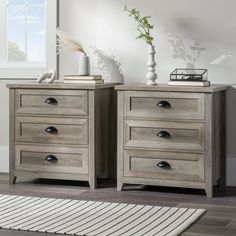 two wooden dressers sitting next to each other in a room