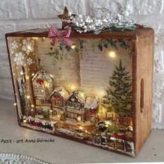 a wooden box with christmas decorations on it