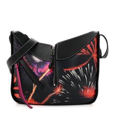 This is an authentic LOEWE Calfskin Small Lunar New Year 2018 Hammock Shoulder Bag in Black and Multicolor.This chic and lovely tote is crafted of luxuriously soft calfskin leather in black multicolor. This handbag features leather strap handles, silver zippers that help expand the length of the bag and an optional adjustable shoulder strap. The top opens to a spacious black fabric interior with small patched pockets. Hammock Bag Loewe, New Year 2018, Silver Zipper, Shoulder Bag Black, Lunar New Year, Lunar New, Black Fabric, Hammock, Calf Skin