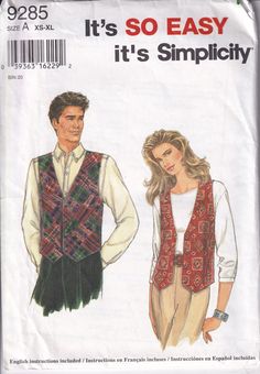 a man and woman wearing vests with ties on the side, in front of an advertisement