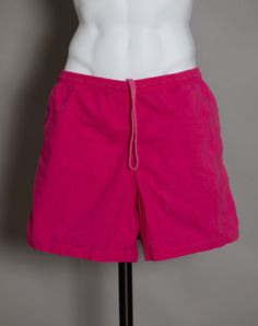 "80s 90s men's shorts in a deep, attention getting, pink. Drawstring, side pockets. BEACH CLUB size - L inseam - 6\" outside length - 17.5\" vintage pre-owned" Pink Swim Trunks For Spring Sports, Pink Swim Trunks For Sports In Spring, Pink Swim Trunks With Built-in Shorts, Sporty Pink Short Swim Trunks, Sporty Pink Short Length Swim Trunks, Pink Cotton Swim Trunks Short Length, Pink Cotton Short Swim Trunks, Casual Pink Cotton Swim Trunks, Pink Short Swim Trunks For Spring