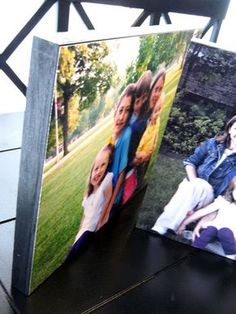 an open book with two pictures on it sitting on a table next to a chair