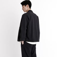 A shirt jacket with a utilitarian touch. Features a paneled construction, spread collar, and button placket. The design is anchored by two oversized gusseted side pockets. Relaxed fit. A staple for transitioning seasons. + Details Color: Black 55% Linen, 45% Cotton XS, S, M, L, XL Julie is 5'9" and wearing a size S Junho is 6'0" and wearing a size S Hand wash cold, lay flat to dry. Do not tumble dry. Can be dry cleaned. + Material A mid-weight woven 55% Linen, 45% Cotton material. This material Knitwear Dress, Pocket Shirt, Signature Collection, Button Placket, Shirt Jacket, Lay Flat, Cotton Material, Hand Wash, Relaxed Fit