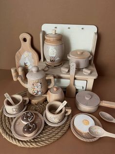 an assortment of wooden kitchen utensils on display