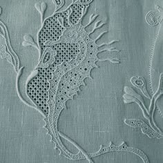 a close up view of an embroidered fabric