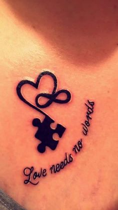 a woman's chest with a piece of puzzle and the words love needs no more