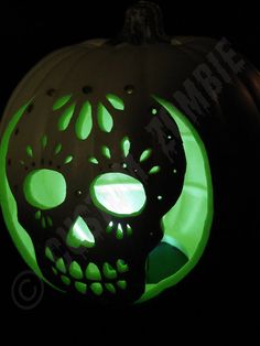 a carved pumpkin with glow in the dark