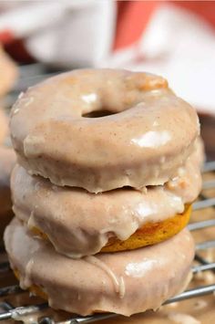 three glazed donuts stacked on top of each other