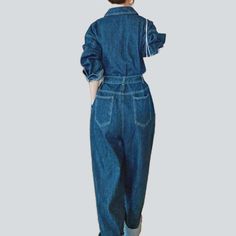 Be transported back to the Pre-millennium with our 2023 Spring-Summer Collection medium wash baggy denim overall! A timeless classic with modern day flair. this one-of-a-kind piece will have you feeling nostalgic and looking fashionably hip. Crafted from luxe denim and featuring a bold buttoned closure. this overall exudes retro chic sophistication.Distinctive Features: 90s Style: Relive the 90s in style with this classic denim overall. Medium Wash: A timeless wash that adds a touch of effortles Baggy Blue Straight Leg Overalls, Blue Baggy Straight Leg Overalls, Utility Dark Wash Denim Jumpsuit With Pockets, Casual Indigo Denim Jumpsuit, Wide Leg Denim Jumpsuit With Pockets, Washed Blue Denim Jumpsuit With Pockets, Dark Wash Wide Leg Denim Jumpsuit With Pockets, Dark Wash Denim Jumpsuit With Wide Legs And Pockets, Medium Wash Relaxed Fit Denim Utility Jumpsuit