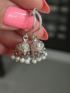 Extra small silver plated jhumki earrings on clip on hoops, Indian style clip on earrings  Earrings dangle 1.50 inches long and are super light perfect for everyday wear.  These beauties are for non pierced ears, they are clip on style. Cheap Metal Jhumkas With Latkans, Earrings For Everyday Wear, Cheap Bohemian Metal Jhumkas, Traditional Silver Dangle Clip-on Earrings, Silver Metal Hoop Earrings With Latkans, Silver Hoop Earrings With Latkans, Silver Dangle Clip-on Jewelry, Silver Clip-on Dangle Jewelry, Elegant Silver Jhumkas