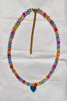 ☙ This transparent colorful crystal beaded necklace, that looks like eatable candies, is all you need to achieve this back in the 90s nostalgia style. It is lightweight and comfortable to wear everyday with your casual outfits to add a playful touch. You can offer it to your friends, kids and partners as a birthday gift or their school year start gift etc. ❧ The necklace has extended chain to fit up to 45 cm ≈ 18 inches length https://www.etsy.com/shop/LeChatAccessories Adjustable Rainbow Crystal Necklace With Faceted Beads, Trendy Handmade Crystal Necklaces, Colorful Beads Rave Festival Jewelry, Y2k Adjustable Beaded Necklaces, Colorful Beaded Rave Jewelry For Festivals, Rave Style Colorful Beads Jewelry For Festivals, Rave Festival Jewelry With Colorful Beads, Adjustable Multicolor Rave Choker, Colorful Beaded Rave Jewelry