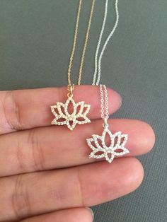 "CZ Embedded Lotus Charm Necklace. Great gift for Friends and family. *Choose your length from 15\" - 18\" *Lotus Pendant measures 13mm x 17mm *Available with Birthstone: https://www.etsy.com/listing/108151390/gold-lotus-necklace-lotus-petal-charm?ref=shop_home_active *In Buddhism the lotus flower is known to be associated with purity, spiritual awakening and faithfulness. The flower is considered pure as it is able to emerge from murky waters in the morning and be perfectly clean. ------------- Buddhist Jewelry, Lotus Flower Jewelry, Lotus Petal, Buddhist Jewellery, Lotus Flower Necklace, Yoga Necklace, Lotus Necklace, Lotus Pendant, Gold Lotus