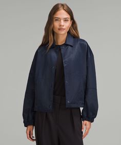 The Glossy Finish On This Coachs Jacket Adds An Irresistible Shimmer To The Day. Designed In An Oversized Fit, Use The Cinchable Hem To Adjust The Shape On The Go. Designed For Casual. Oversized Fit Is Purposefully Large With Exaggerated Proportions. Size Down If You Prefer A Slimmer Fit. Zippered Hand Pockets With Hidden Phone Sleeve. Zippered Interior Pockets. Cinchable Hem. | Cropped Coach's Jacket Coach Jacket Woman, Fall Activewear, Fall Style Guide, Fall Denim, Athleisure Fashion, Coach Jacket, Fashion Advertising, Tennis Dress, Women's Coats & Jackets