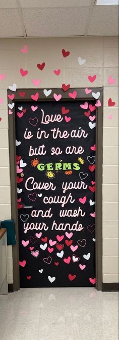 a classroom door decorated with hearts and the words love is in the air but so are germs