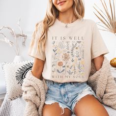 A boho Christian shirt featuring boho wildflowers and an inspirational bible verse. Perfect Christian gift, gift for women, a garden lover gift, or keep this cottagecore shirt for yourself to share your faith and love for botanical designs.  Boho Christian T Shirt for Women, Wildflower Tshirt Faith Shirt Christian Gift for Women Garden Lover Shirt Floral Friend Gift Cottagecore **SIMPLE STEPS TO ORDER** 1) Please review ALL product photos including Size Chart. 2) Select your T-Shirt color and T- Boho Christian, Garden Lover Gifts, Cottagecore Shirt, Christian Gifts For Women, Christian T Shirt, Faith Shirt, Christian Shirt, T Shirt For Women, Shirt For Women