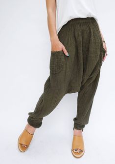 "🚚..ALL ORDERS ARE SHIPPED VIA DHL EXPRESS MAIL Super comfy and cozy harem style pants with a slight stretch. The elastic waist and dropped crotch give your palate room to indulge. They're cropped to stop mid-calf, and elastic at the hems keep the legs in place on those odd instances you find yourself upside-down. * Pullover style * Elastic waistband * Two front pockets * Tapered leg, elastic hem * Unlined Measurements approximately: Waist: 24\" (61 cm) stretching to 54\" (137 cm) Hip: 56\" (14 Pants Boho, Trousers Casual, Womens Pants, Double Gauze, Style Pants, Cotton Pants, Upside Down, Dhl Express, Mid Calf