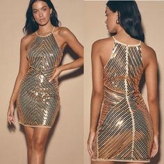 Rows of stunning gold sequins, over beige mesh, are laid in a eye-catching geometric pattern over a sleeveless, bodycon bodice with halter neckline. Short, bodycon skirt. Hidden back zipper/clasp. Lined. 100% Polyester. Hand Wash Cold. Imported. 33" Gold Sleeveless Mini Dress With Contrast Sequin, Gold Mini Dress With Contrast Sequin For Party, Gold Party Mini Dress With Contrast Sequin, Glamorous Gold Mini Dress With Contrast Sequin, Gold Bodycon Backless Mini Dress, Gold Mini Length Sequin Dress For Night Out, Gold Mini Sequin Dress For Night Out, Gold Sequin Mini Dress For Night Out, Gold Sleeveless Halter Dress For Night Out