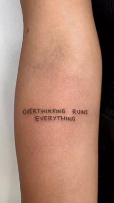 a woman's thigh with the words, overthiking runs everything on it